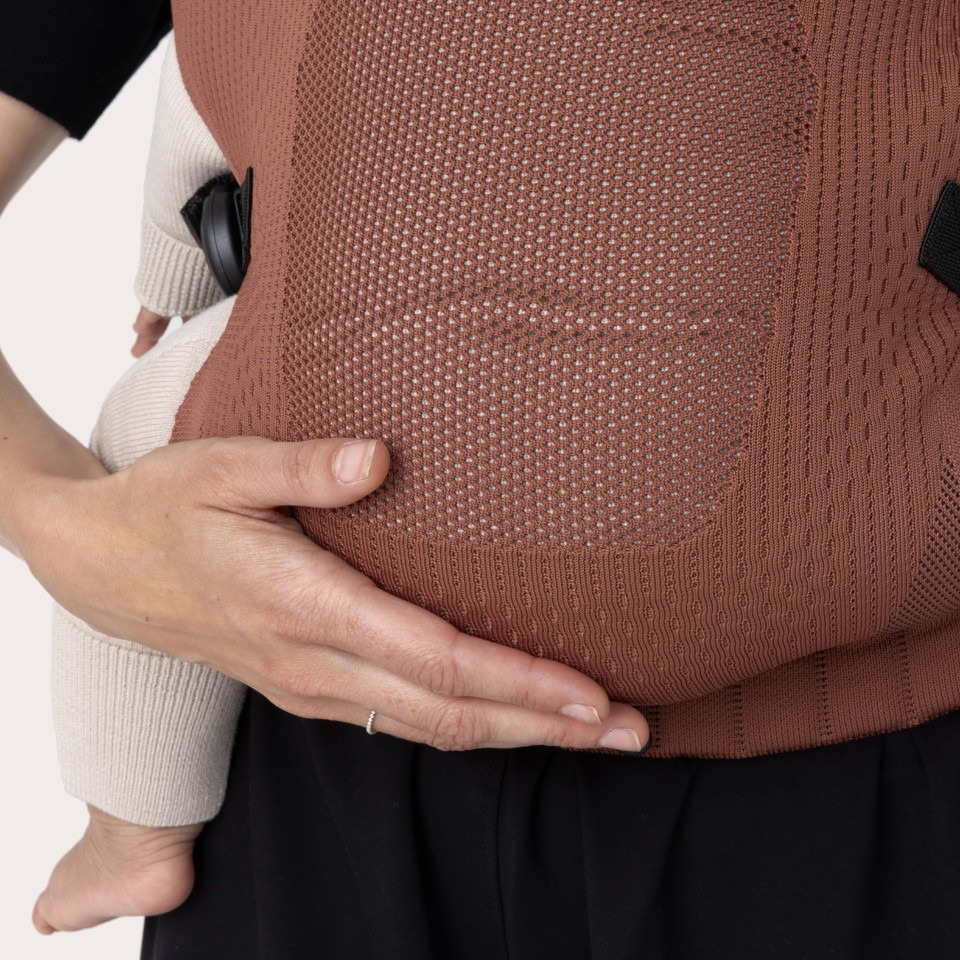 Flybaby Detailaufnahme Trage Sitz des Babys